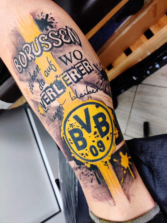 Feines Lettering Tattoo mit Schriftzug aus Berlin